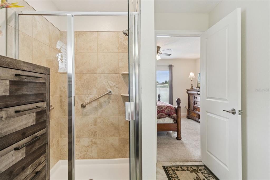 3342 Raleigh Drive Winter Haven, FL 33884 - Photo 19 of 50 a bathroom with a shower and a sink
