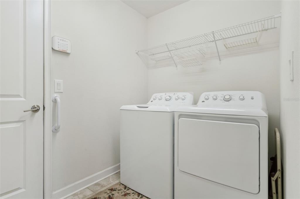 3342 Raleigh Drive Winter Haven, FL 33884 - Photo 22 of 50 a utility room with dryer and washer