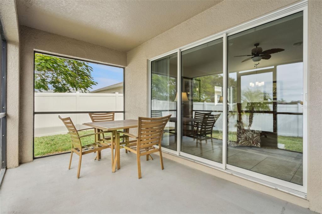3342 Raleigh Drive Winter Haven, FL 33884 - Photo 25 of 50 a view of a big room with wooden floor and windows