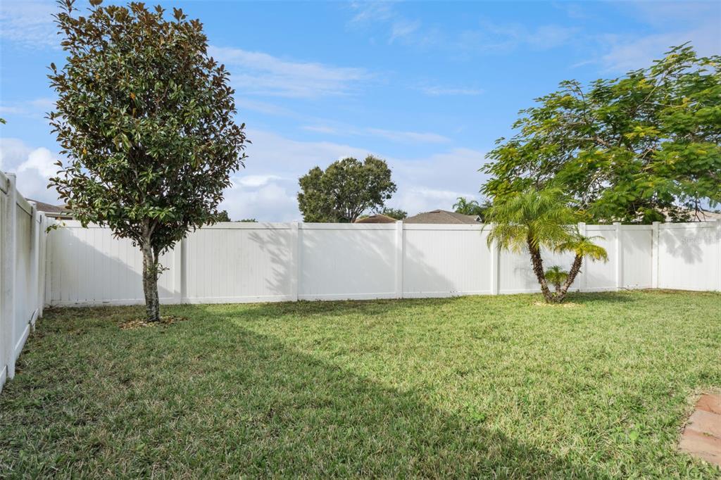 3342 Raleigh Drive Winter Haven, FL 33884 - Photo 27 of 50 a view of a tree with a house in the background