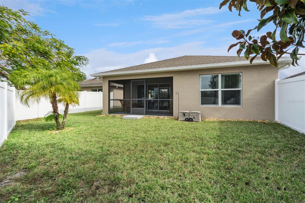 3342 Raleigh Drive Winter Haven, FL 33884 - Photo 30 of 50 front view of a house with a yard