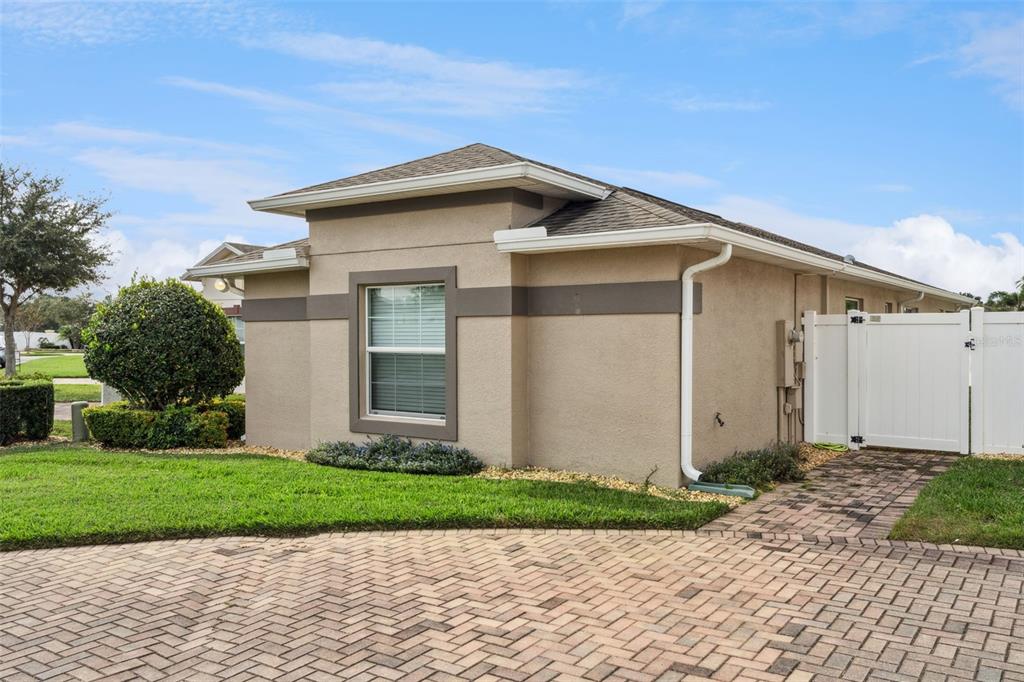 3342 Raleigh Drive Winter Haven, FL 33884 - Photo 31 of 50 a front view of a house with a yard and garage