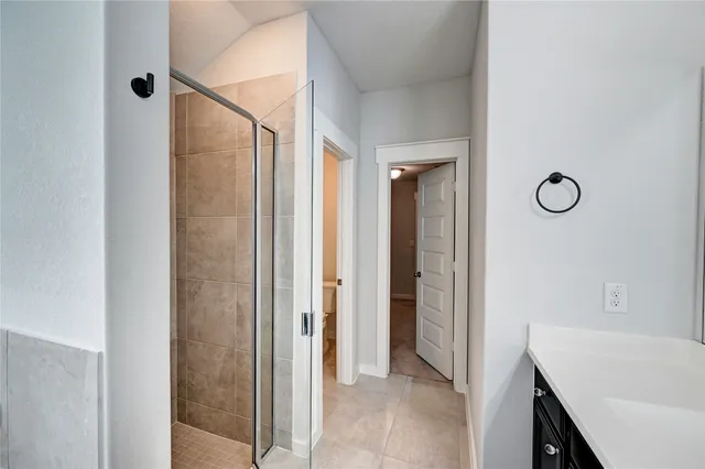 a view of a bathroom from the hallway