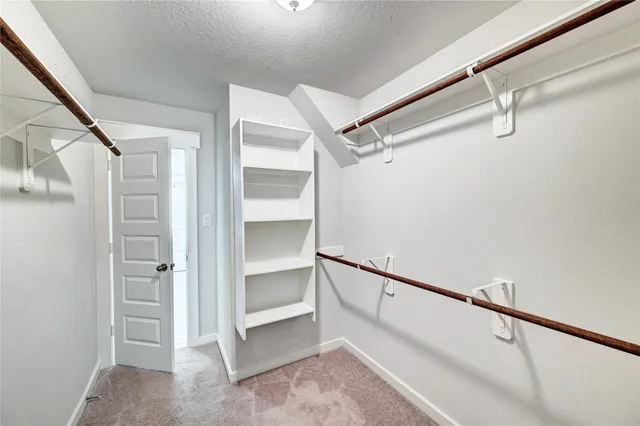 a bathroom with a double vanity sink a and mirror