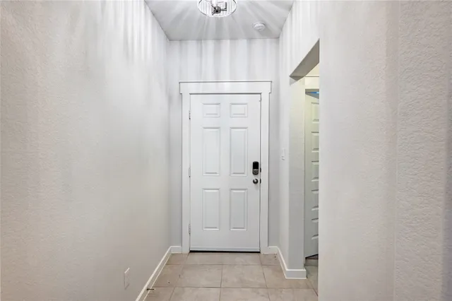 a green field with lots of bushes