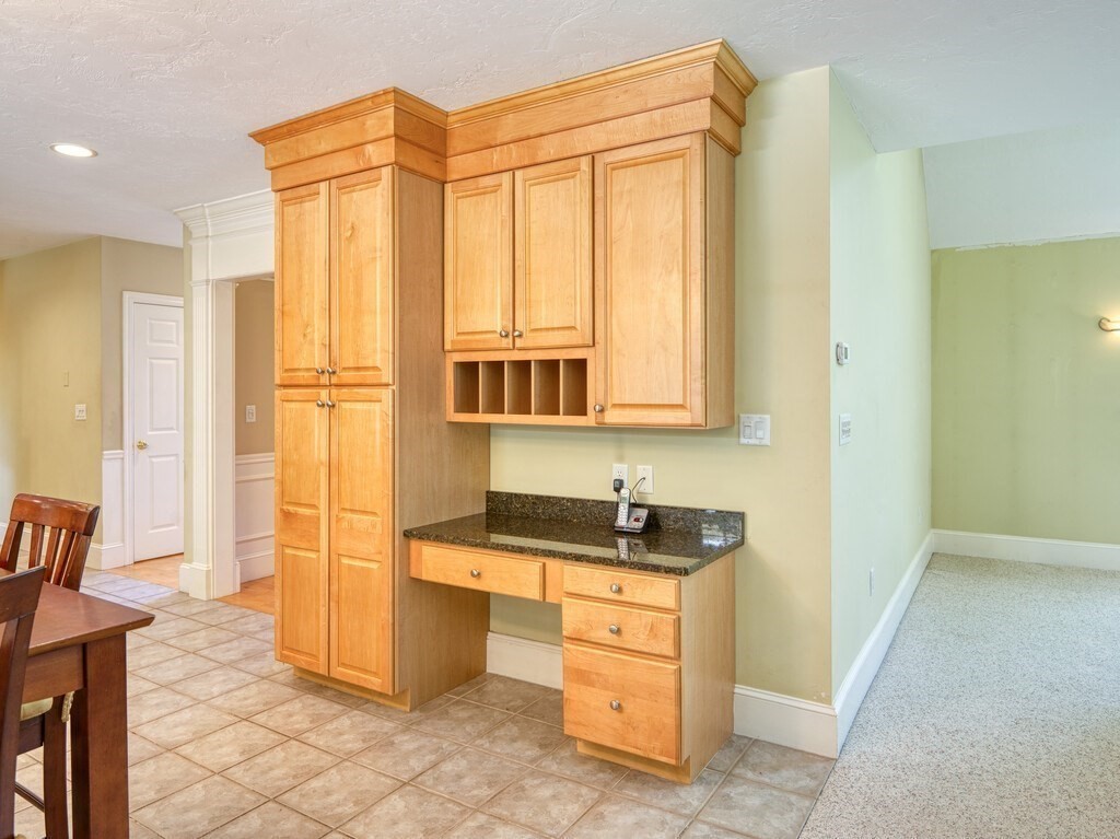 126 Walnut Street Shrewsbury, MA 01545 - Photo 13 of 41 a bathroom with a sink and a mirror
