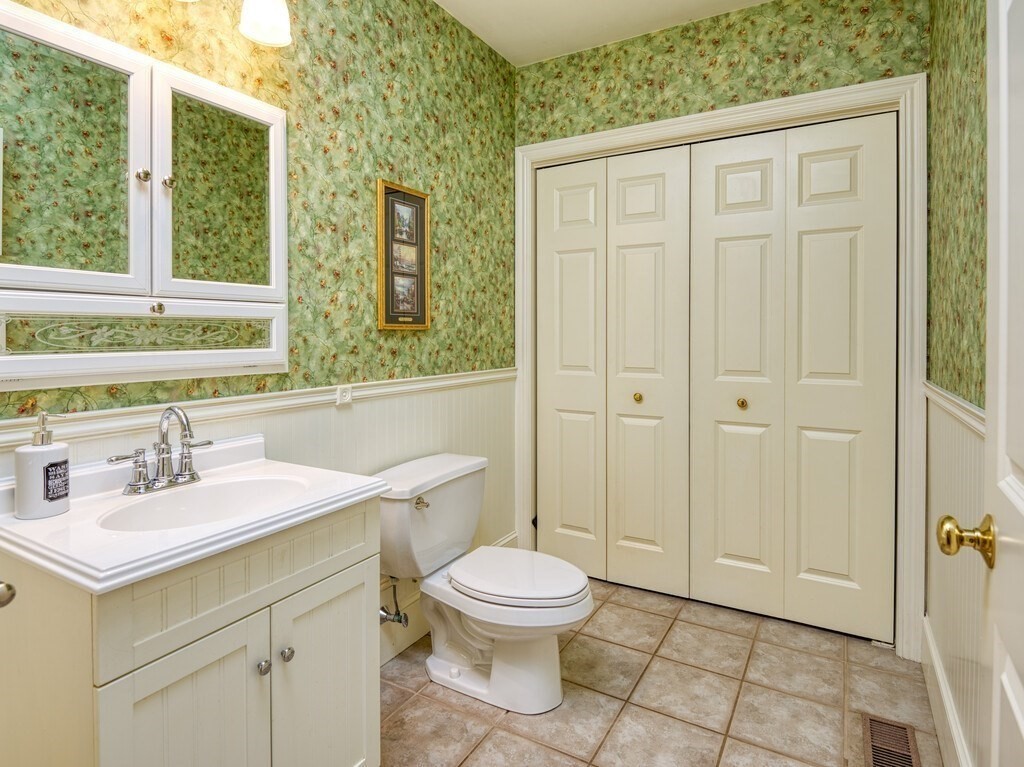 126 Walnut Street Shrewsbury, MA 01545 - Photo 20 of 41 a bathroom with a sink a toilet and shower