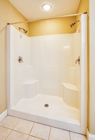 126 Walnut Street Shrewsbury, MA 01545 - Photo 27 of 41 a bathroom with a shower and a bath tub