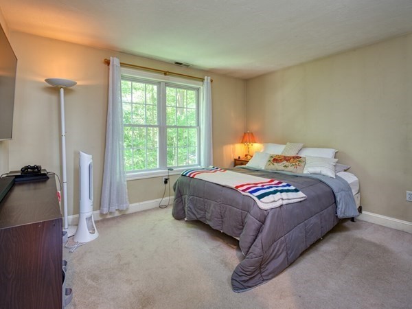 126 Walnut Street Shrewsbury, MA 01545 - Photo 28 of 41 a bedroom with a bed and a large window