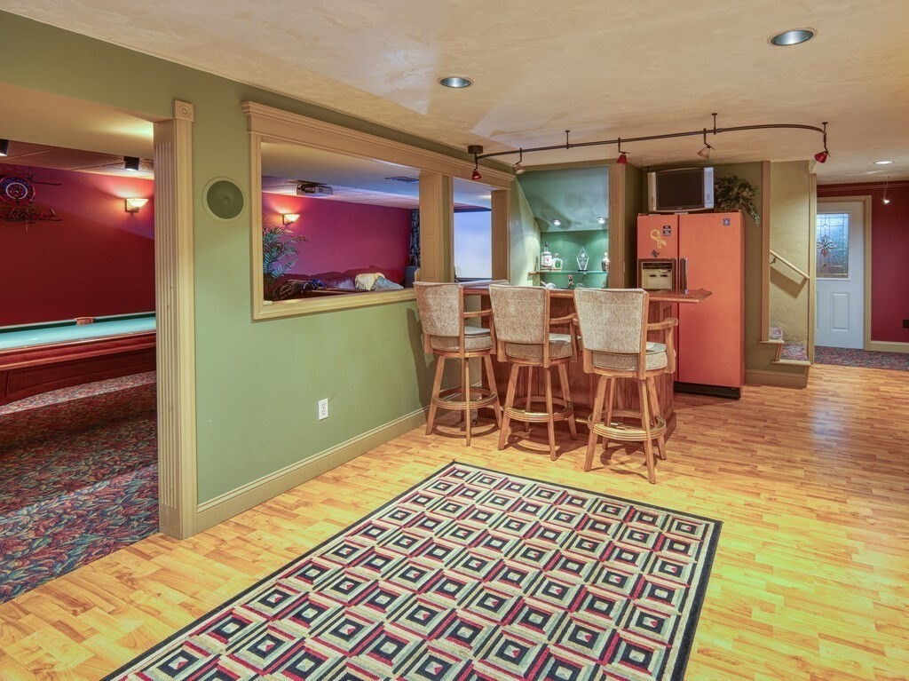 126 Walnut Street Shrewsbury, MA 01545 - Photo 34 of 41 a dining room with furniture a rug a rug and a rug