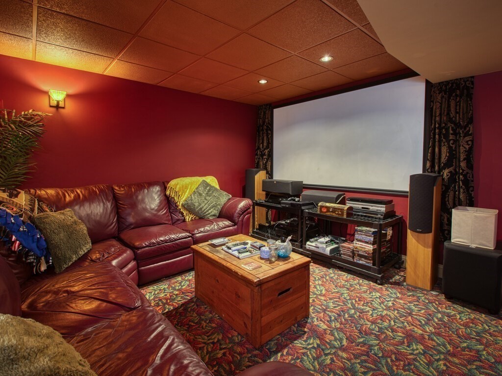 126 Walnut Street Shrewsbury, MA 01545 - Photo 37 of 41 a living room with furniture and a flat screen tv