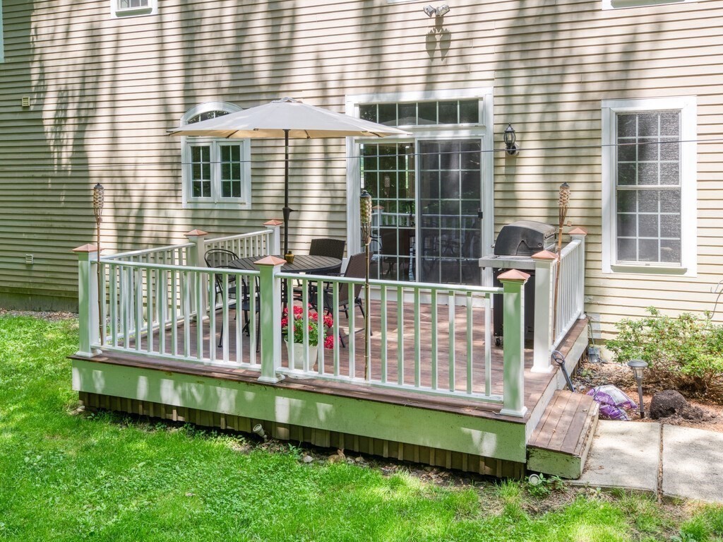 126 Walnut Street Shrewsbury, MA 01545 - Photo 39 of 41 a front view of a house with a yard