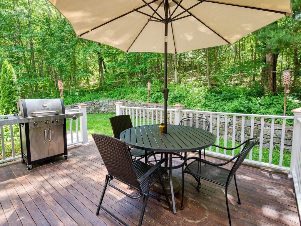 126 Walnut Street Shrewsbury, MA 01545 - Photo 40 of 41 a view of a table and chairs in the patio