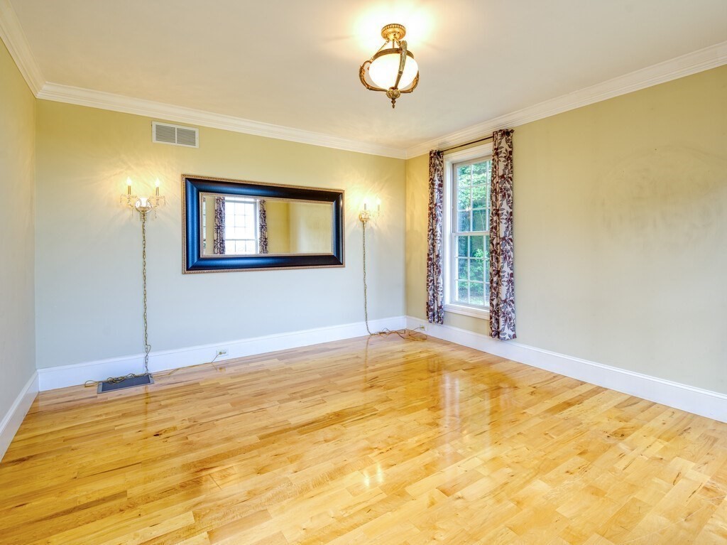 126 Walnut Street Shrewsbury, MA 01545 - Photo 4 of 41 a view of empty room with a window