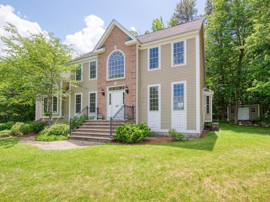 126 Walnut Street Shrewsbury, MA 01545 - Photo 41 of 41 a front view of a house with a yard