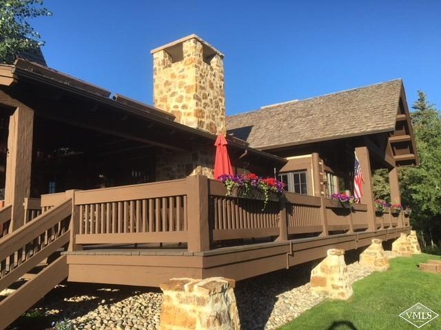 303 Graham Road Edwards, CO 81632 - Photo 12 of 13 a view of a house with wooden floor roof and deck