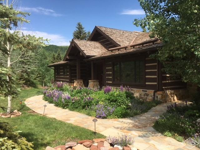303 Graham Road Edwards, CO 81632 - Photo 13 of 13 a front view of a house with a yard