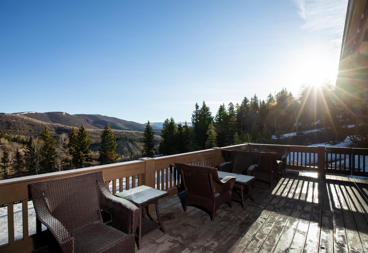 303 Graham Road Edwards, CO 81632 - Photo 6 of 13 a view of a chairs and table on the roof deck