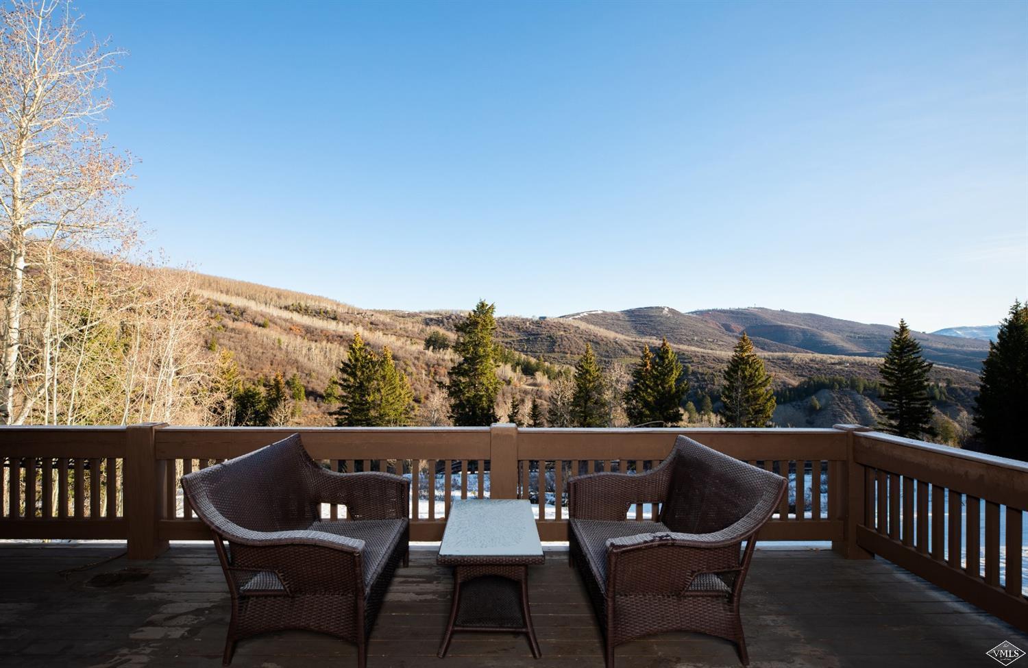 303 Graham Road Edwards, CO 81632 - Photo 7 of 13 a view of a chair and table on the roof deck
