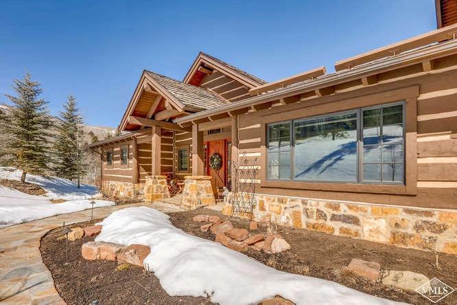 303 Graham Road Edwards, CO 81632 - Photo 9 of 13 a view of a house with a patio