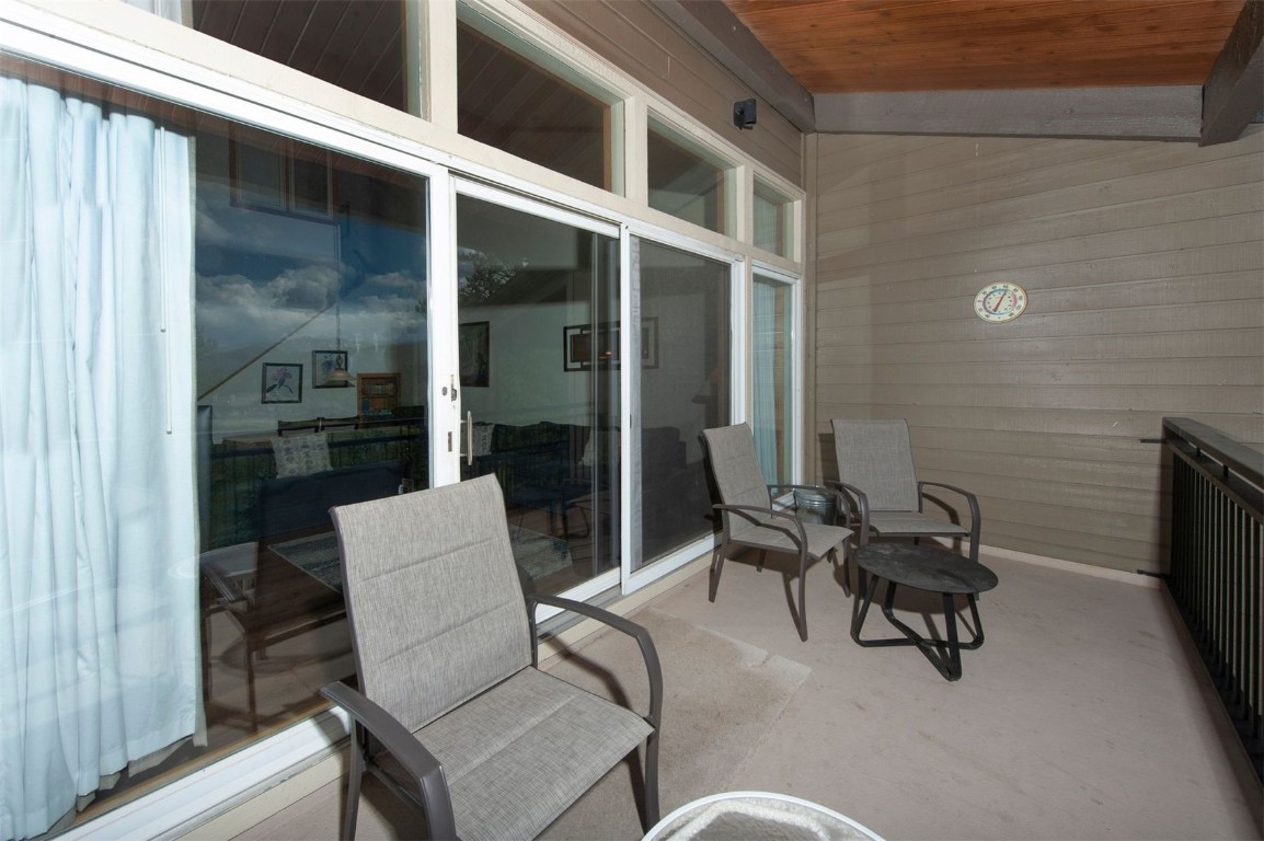 21630 Highway 6, Unit 2150 Keystone, CO 80435 - Photo 14 of 46 a balcony with table and chairs