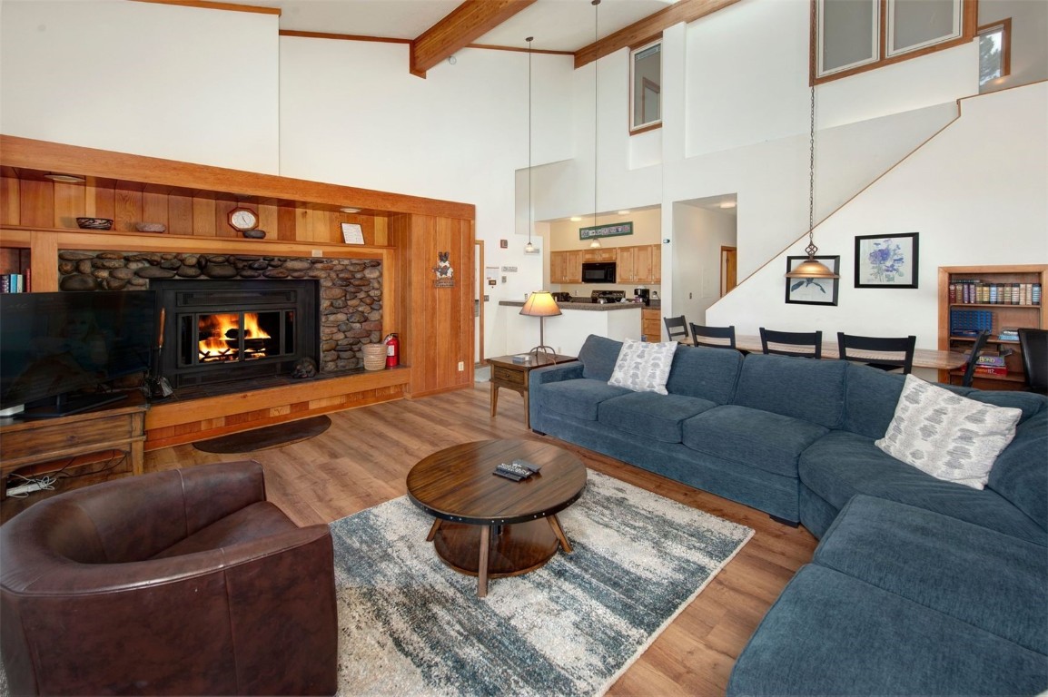 21630 Highway 6, Unit 2150 Keystone, CO 80435 - Photo 2 of 46 a living room with furniture and a fireplace