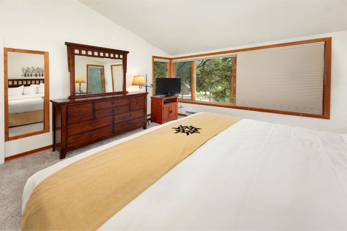 21630 Highway 6, Unit 2150 Keystone, CO 80435 - Photo 22 of 46 a living room with furniture and a flat screen tv