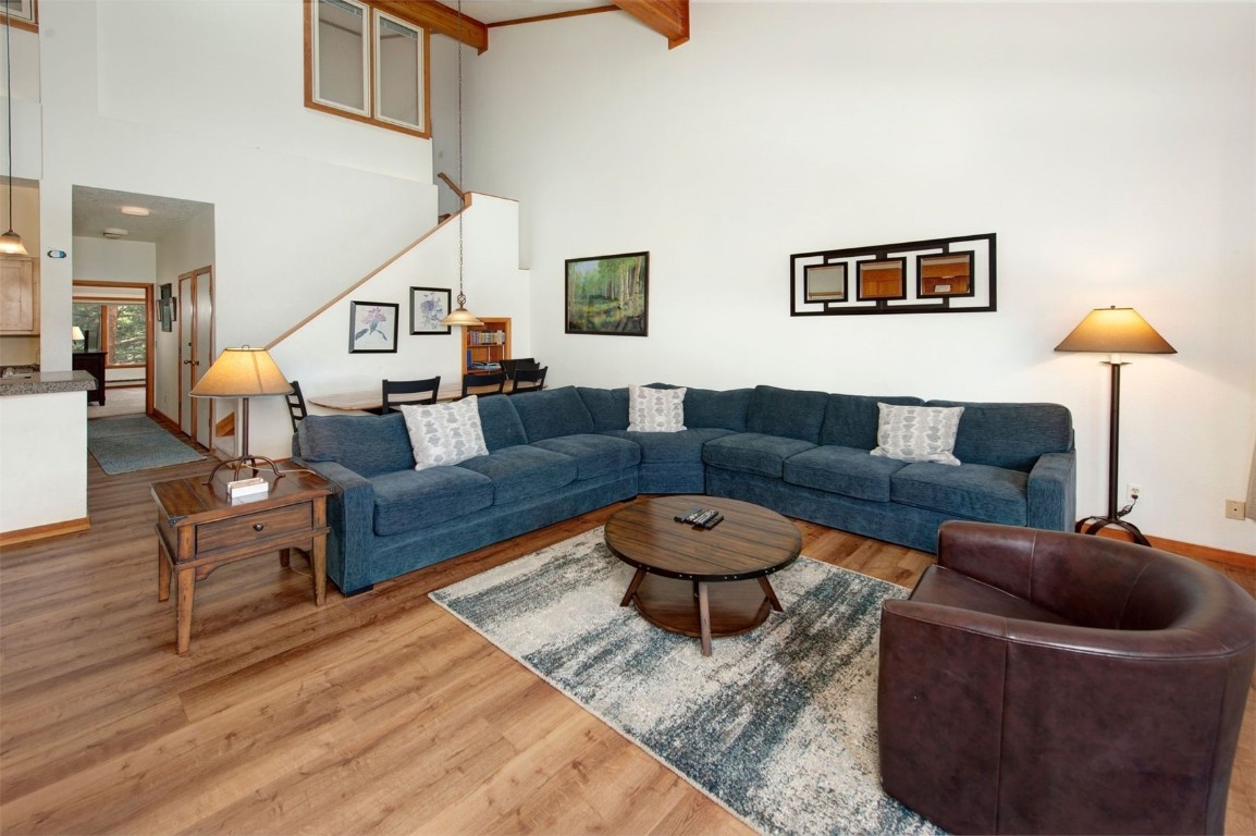 21630 Highway 6, Unit 2150 Keystone, CO 80435 - Photo 3 of 46 a living room with furniture and a lamp