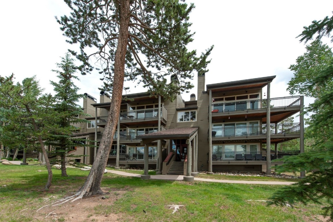 21630 Highway 6, Unit 2150 Keystone, CO 80435 - Photo 37 of 46 a view of a house with a yard and plants