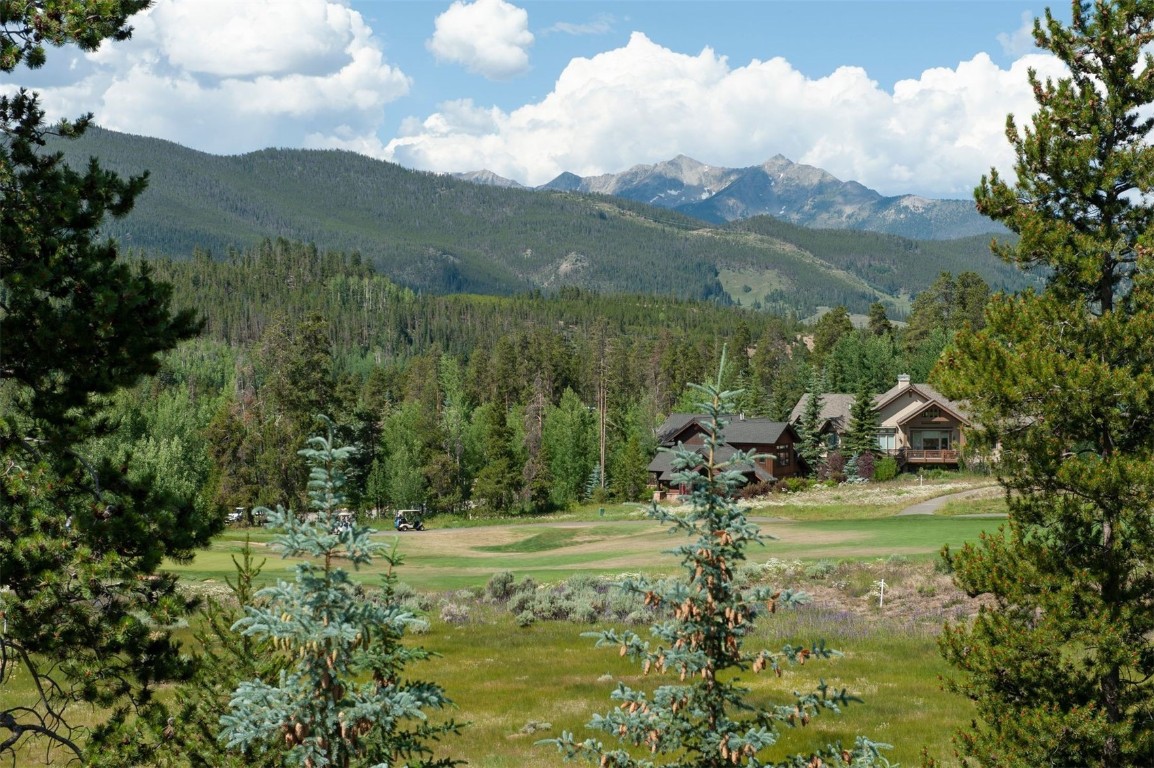 21630 Highway 6, Unit 2150 Keystone, CO 80435 - Photo 45 of 46 a view of a town with mountains in the background