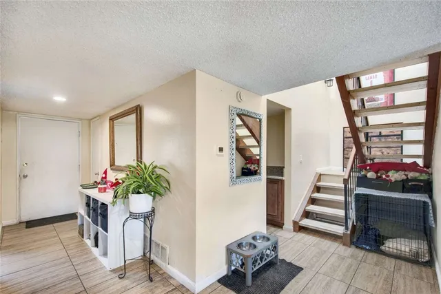 a room with furniture and flowers