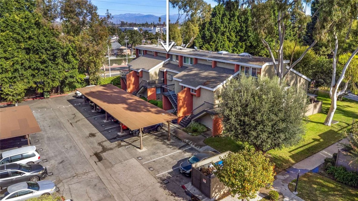 6733 Caro Street, Unit 47 Paramount, CA 90723 - Photo 22 of 25 a view of a chairs and table in the patio