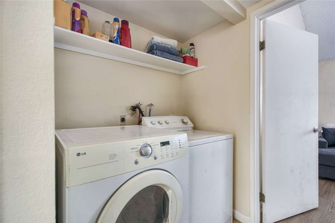 6733 Caro Street, Unit 47 Paramount, CA 90723 - Photo 7 of 25 a utility room with dryer and washer