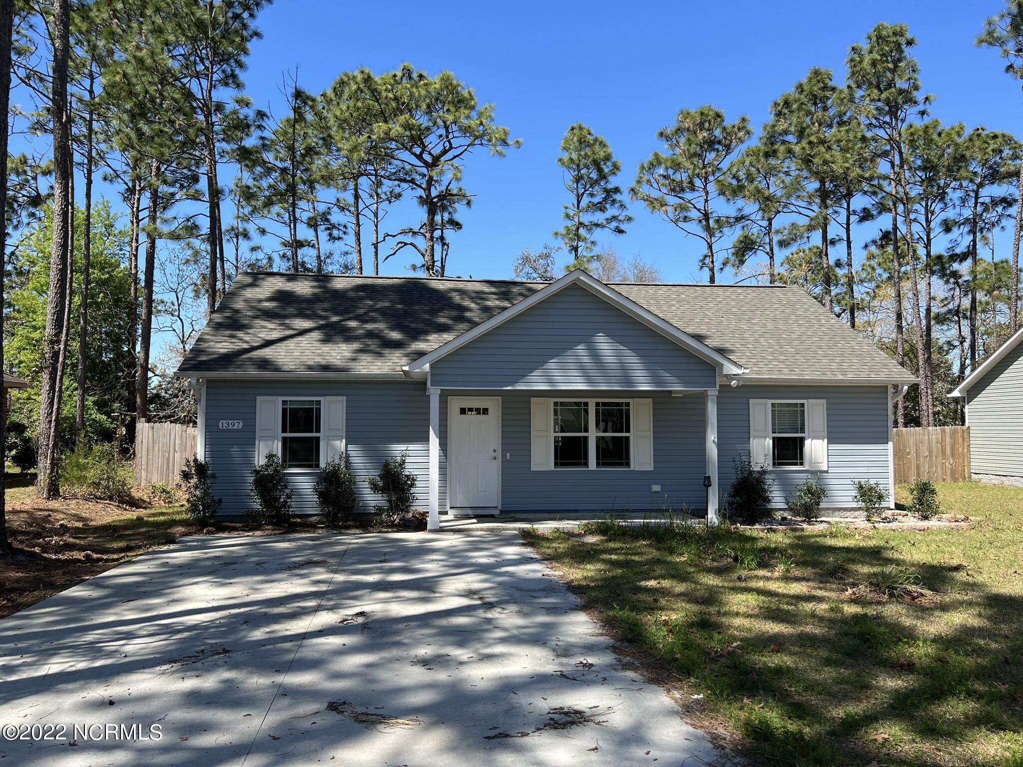 1397 East Boiling Spring Road Boiling Spring Lakes, NC 28461 - Photo 1 of 17 Front