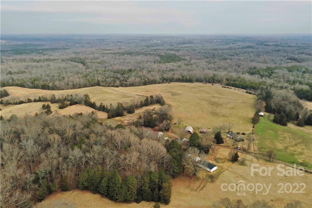 460 Pine Grove Church Road Concord, NC 28025 - Photo 19 of 45 a view of a dry yard with trees