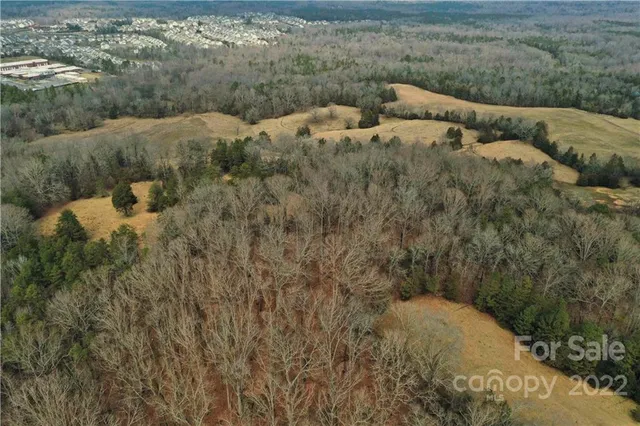 a view of a yard with an outdoor space