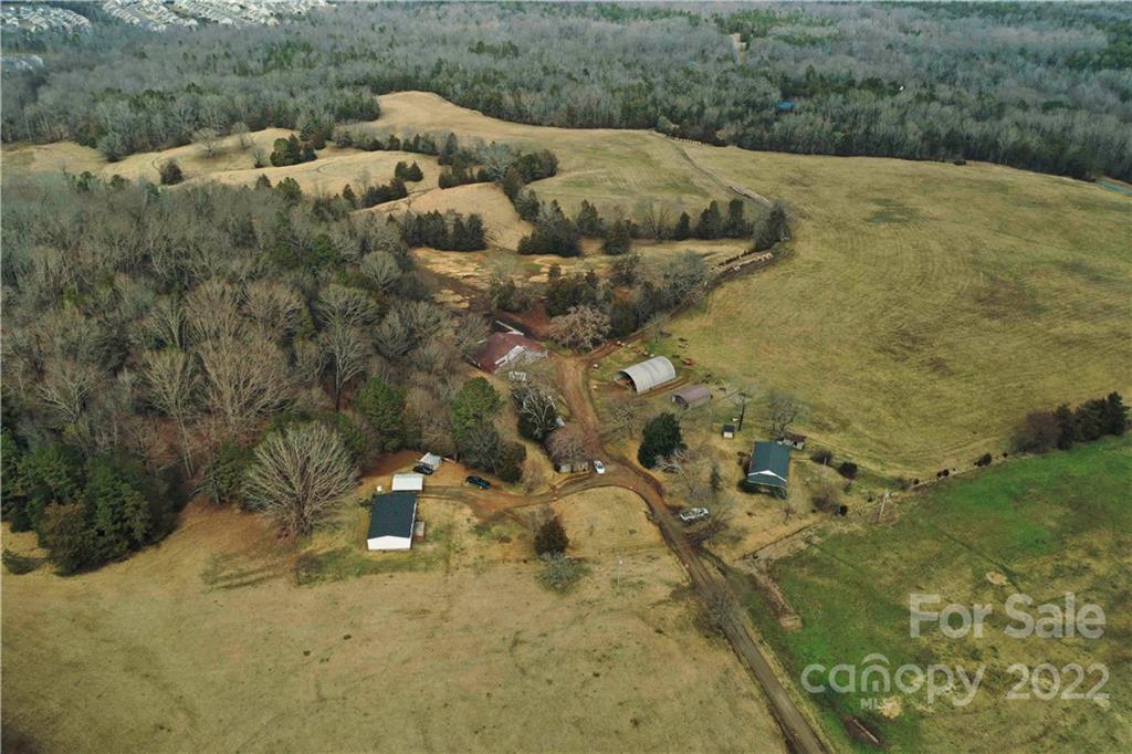 460 Pine Grove Church Road Concord, NC 28025 - Photo 26 of 45 a view of a yard with an outdoor space