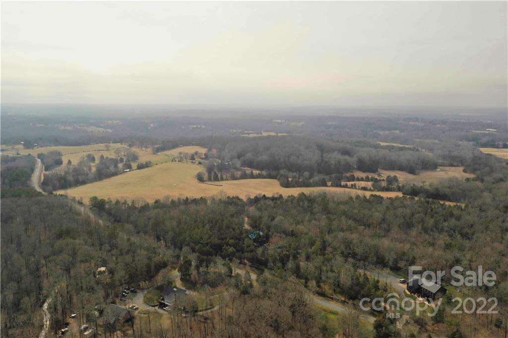 460 Pine Grove Church Road Concord, NC 28025 - Photo 39 of 45 an aerial view of residential houses with outdoor space