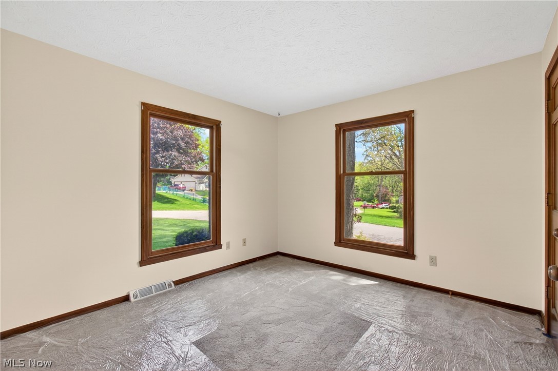 5346 Burlawn Street Northwest Canton, OH 44708 - Photo 19 of 40 Neutral wall paint with contrasting wood trim and window frames