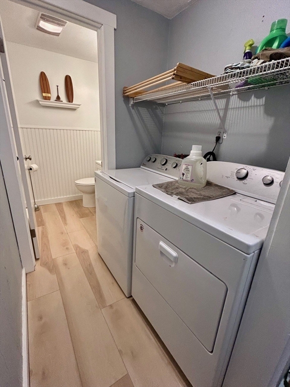 300 Falmouth Road, Unit 6B Mashpee, MA 02649 - Photo 14 of 27 a utility room with dryer and washer