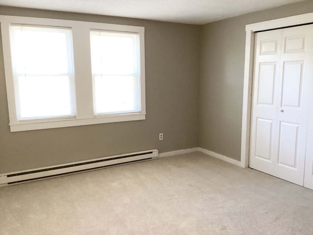 300 Falmouth Road, Unit 6B Mashpee, MA 02649 - Photo 17 of 27 an empty room with a window