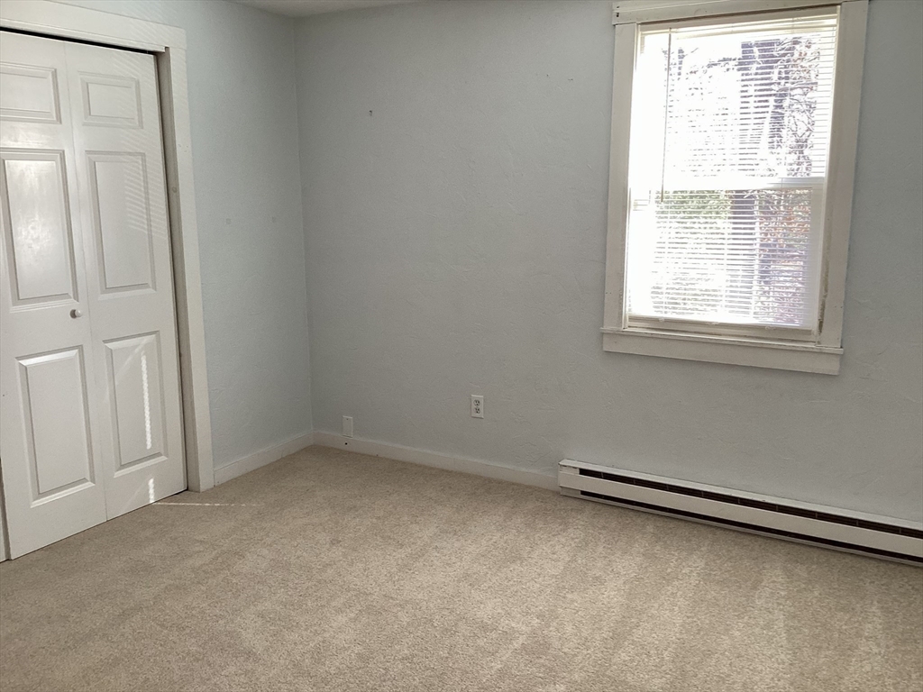 300 Falmouth Road, Unit 6B Mashpee, MA 02649 - Photo 21 of 27 an empty room with a window