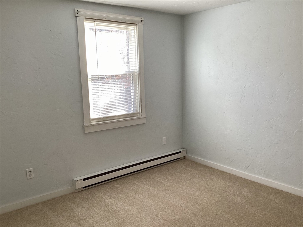 300 Falmouth Road, Unit 6B Mashpee, MA 02649 - Photo 22 of 27 an empty room with a window