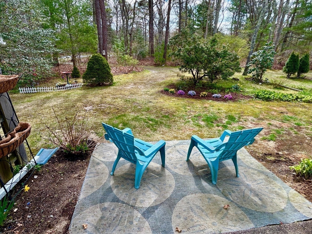 300 Falmouth Road, Unit 6B Mashpee, MA 02649 - Photo 23 of 27 a view of a yard with furniture
