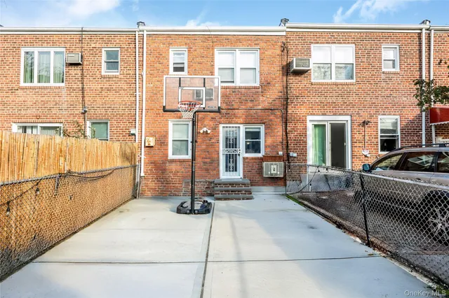 a view of a brick building with a outdoor space