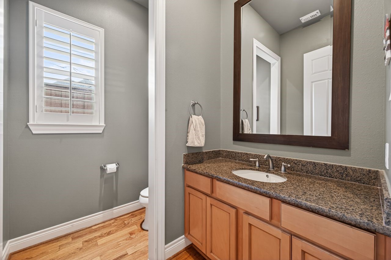 10932 Lasso Lane Houston, TX 77079 - Photo 13 of 38 a bathroom with a sink and a mirror