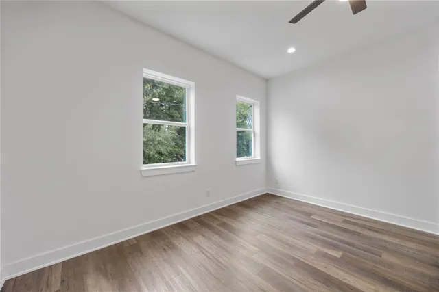 an empty room with windows