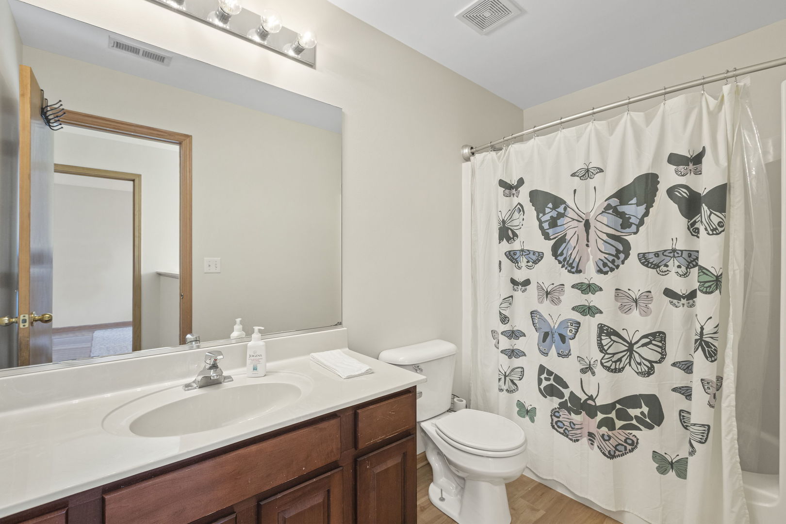 223 Aspen Circle Gilberts, IL 60136 - Photo 14 of 18 a bathroom with a sink toilet and a mirror