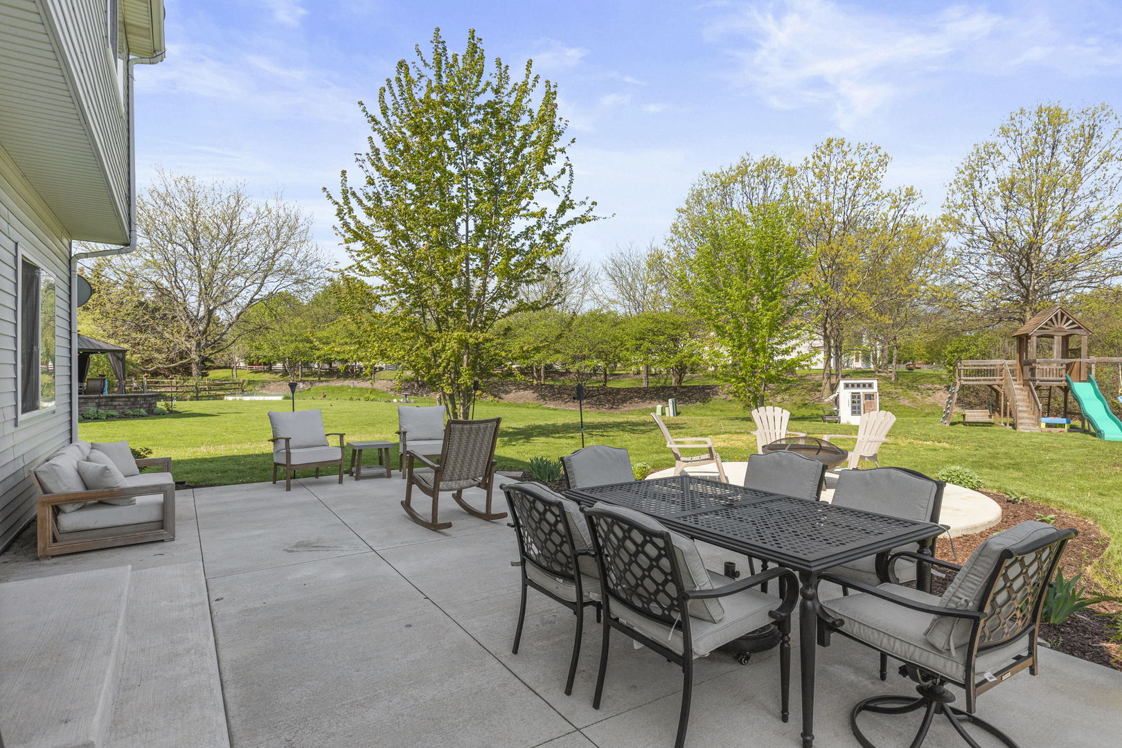 223 Aspen Circle Gilberts, IL 60136 - Photo 17 of 18 a view of a patio with garden and furniture