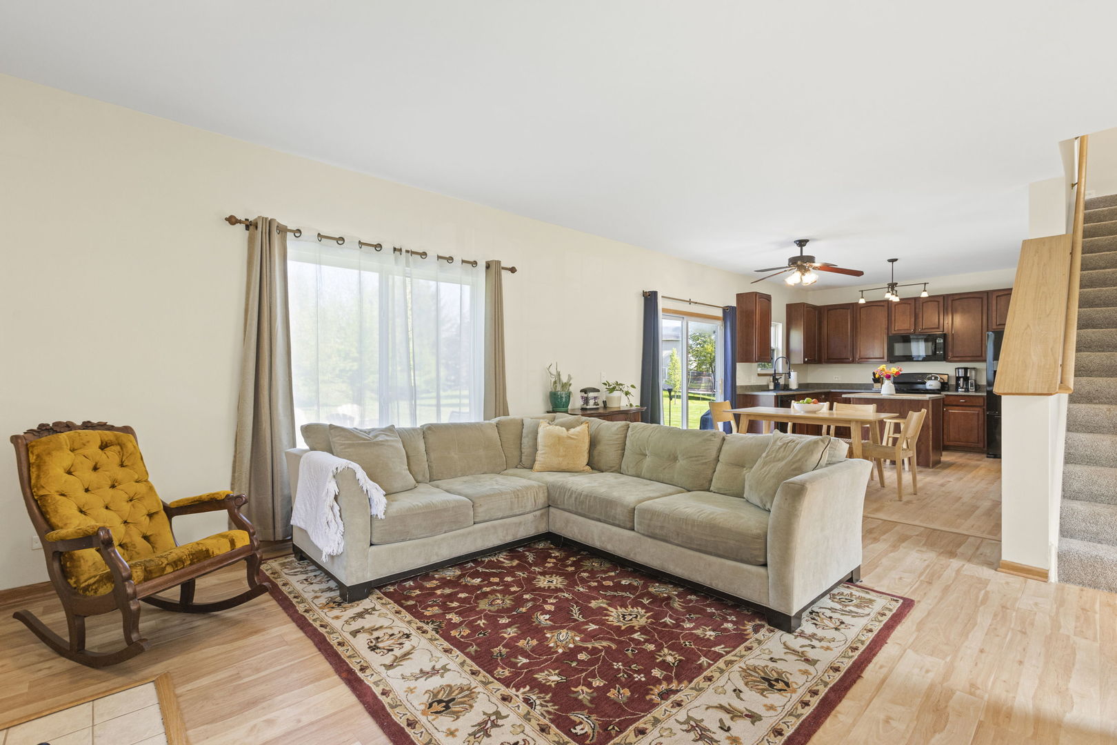 223 Aspen Circle Gilberts, IL 60136 - Photo 2 of 18 a living room with furniture and a large window
